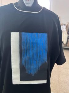 Le tre T-shirt che riproducono le tre opere del maestro Nunzio